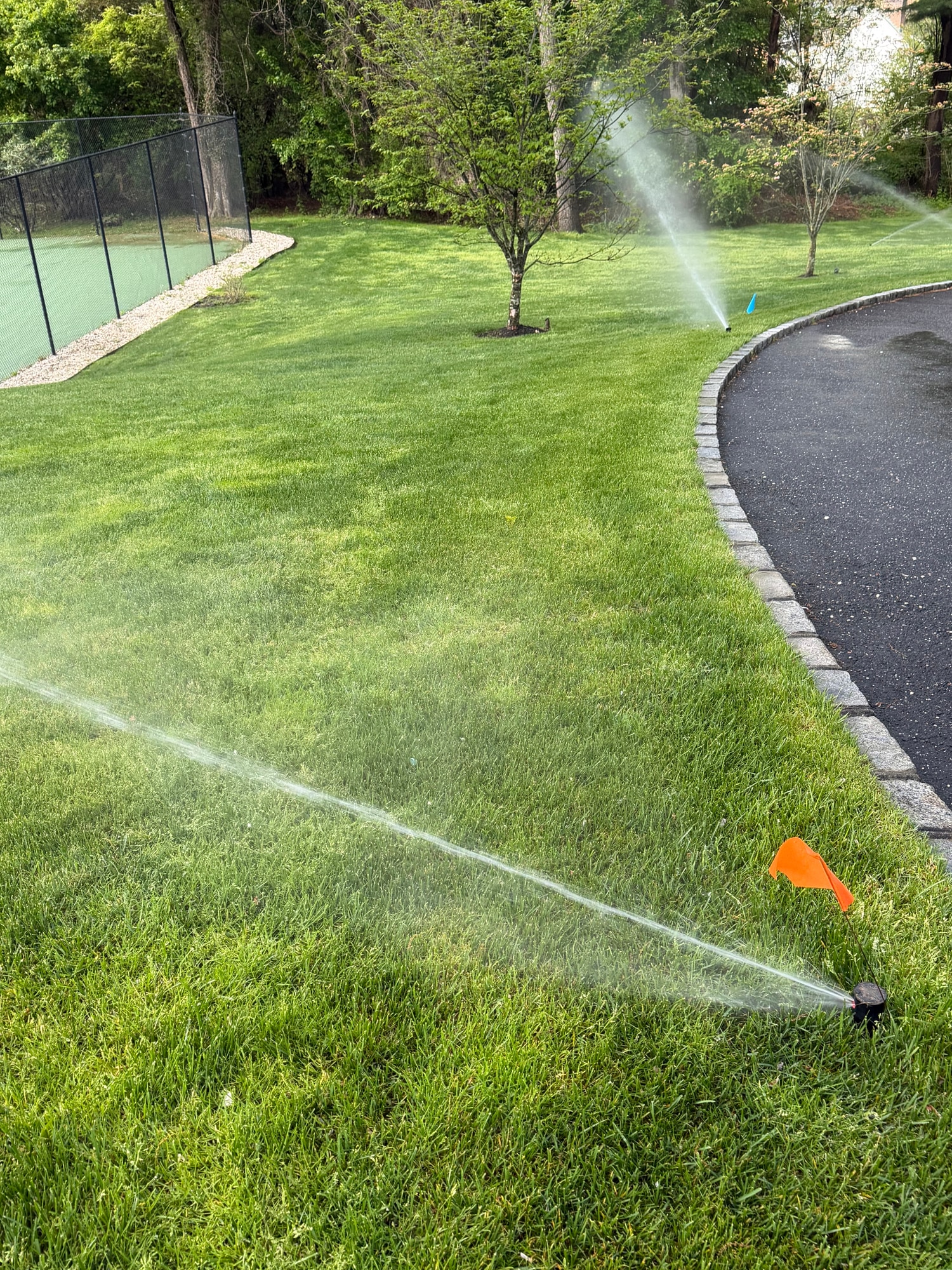 Finished sprinkler system delivering even lawn coverage